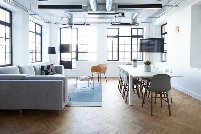 Room with white walls and wooden floor