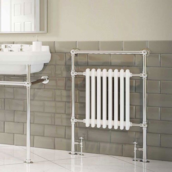 Trade Direct Wessex Traditional Towel Rail White 960mm x 675mm in a modern yet traditional bathroom, next to a sink.
