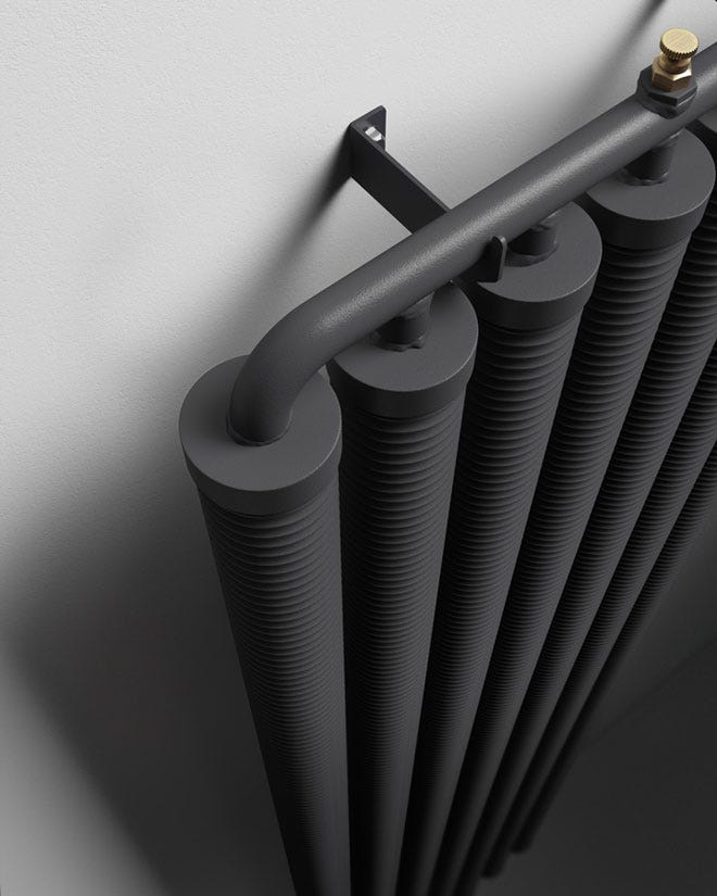 Close up of an anthracite Trade Direct Ribbon Designer Radiator.