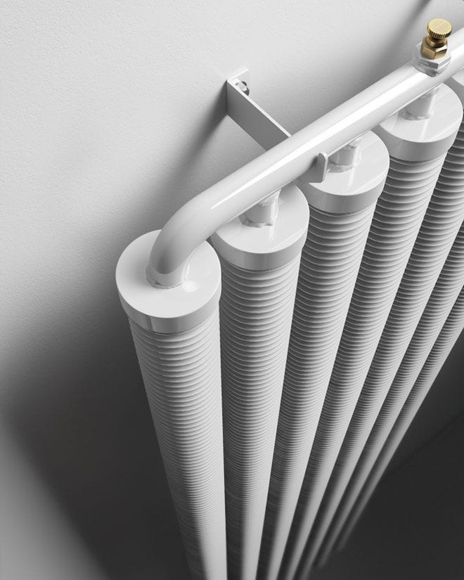 Close up of a white ribbon designer radiator from Trade Radiators