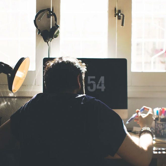 A man working in a home office
