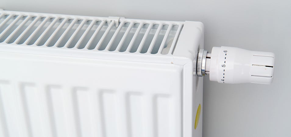 A convector radiator with top grill