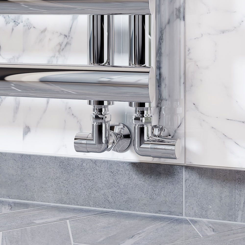 A white and chrome corner thermostatic radiator valve