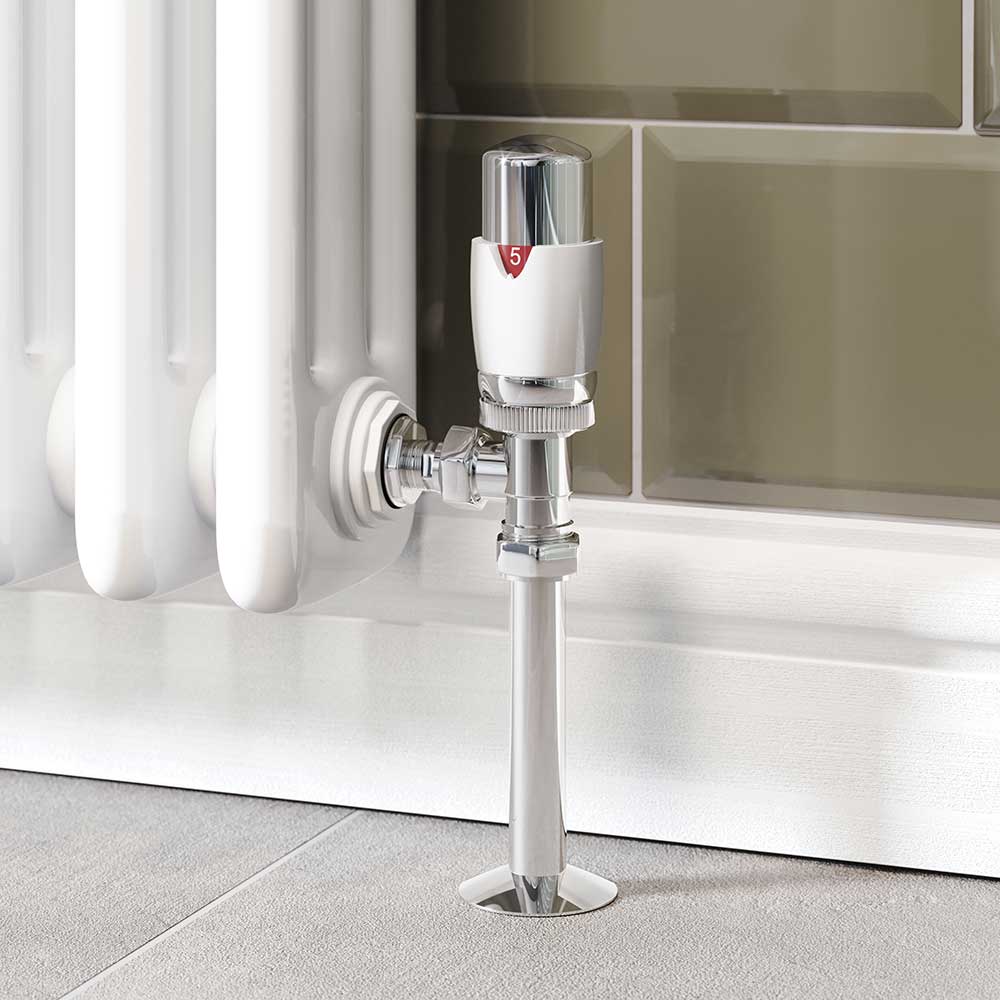 An angled black thermostatic radiator valve