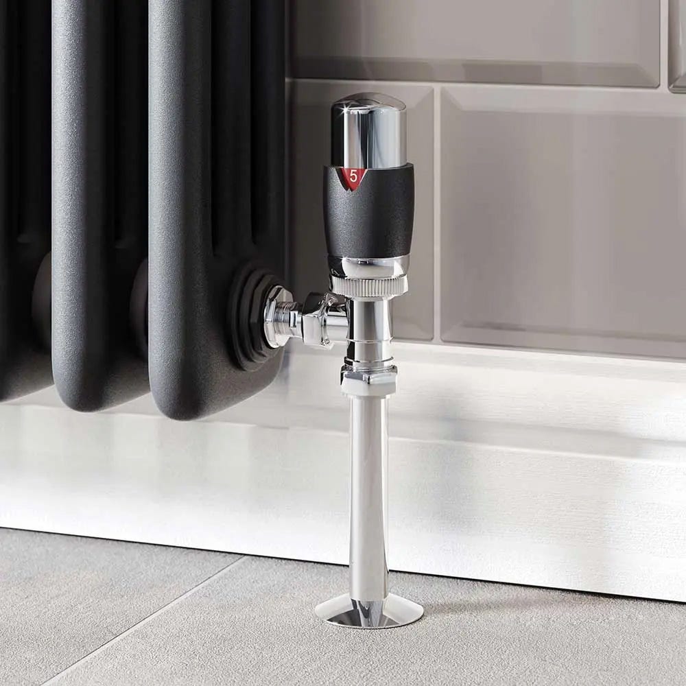 An angled black thermostatic radiator valve