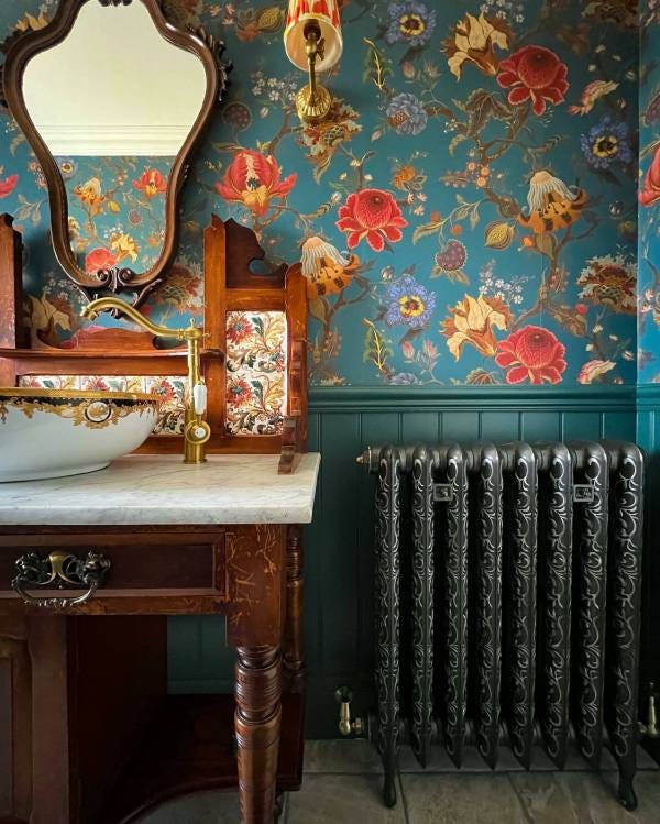 A traditional bathroom featuring a Paladin Kensington cast iron radiator