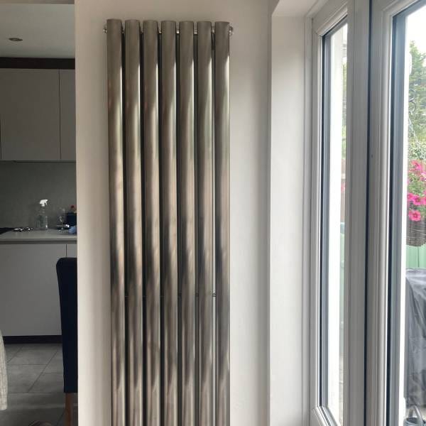 A DQ Cove stainless steel vertical designer radiator