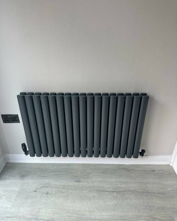 An anthracite horizontal Trade Direct Saturn designer radiator