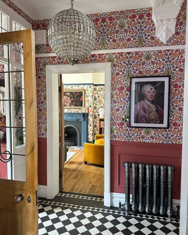 Cast iron radiator in a decorated hallway
