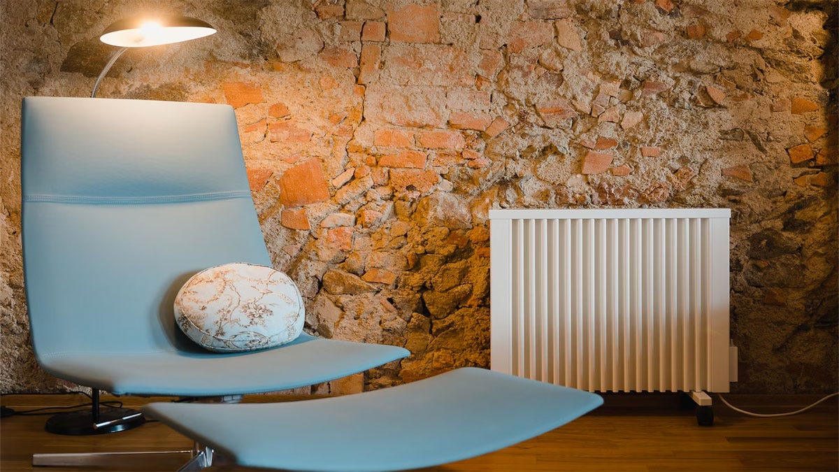 A portable electric heater in a roomset