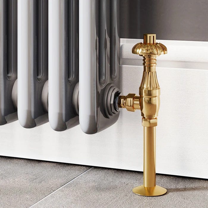 A traditional brass thermostatic radiator valve